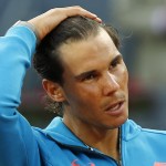
              FILE - In this May 10, 2015, file photo, Rafael Nadal, of Spain, makes a speech after losing to Andy Murray of Britain during the men's final at the Madrid Open Tennis tournament in Madrid, Spain. For years and years _ a full decade, in fact _ Nadal has dominated the French Open the way no one has ever dominated a Grand Slam tennis tournament. Despite the way he's ruled Roland Garros, Novak Djokovic is considered the man to beat, (AP Photo/Paul White, File)
            