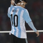 
              Argentina's Lionel Messi takes off the Copa America silver medal after the final game with Chile at the National Stadium in Santiago, Chile, Saturday, July 4, 2015. Chile's goalkeeper Claudio Bravo made a save and striker Alexis Sanchez converted the winning penalty as host Chile defeated Argentina 4-1 in a shootout after a 0-0 draw in the Copa America final. (AP Photo/Luis Hidalgo)
            