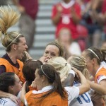 
              England players celebrate their 2-1 win over Canada following a FIFA Women's World Cup quarterfinal soccer game in Vancouver, British Columbia, Canada, on Saturday, June 27, 2015. (Jonathan Hayward/The Canadian Press via AP) MANDATORY CREDIT
            