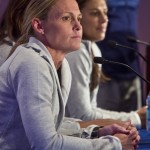 
              U.S. women's soccer players Christie Rampone, left, and Carli Lloyd, right, listens during U.S. Women's National Team World Cup media day, Wednesday, May 27, 2015, in New York. The U.S. women will face South Korea on Saturday, May 30 at Red Bull Arena in their final send-off match, before leaving for Canada and the 2015 FIFA Women's World Cup. (AP Photo/Bebeto Matthews)
            