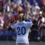
              United States midfielder Gyasi Zardes (20) celebrates his goal against Cuba during the first half of a CONCACAF Gold Cup soccer quarterfinal match, Saturday, July 18, 2015, in Baltimore. (AP Photo/Nick Wass)
            