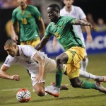 
              United States’ Clint Dempsey (8) and Jamaica’s Je-Vaughn Watson (15) vie for at the ball during the first half of a CONCACAF Gold Cup soccer semifinal, Wednesday, July 22, 2015, in Atlanta. (AP Photo/John Bazemore)
            