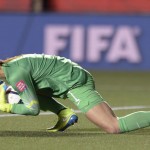 
              U.S. keeper Hope Solo covers the ball after making a save against China during the second half of a quarterfinal match in the FIFA Women's World Cup soccer tournament, Friday, June 26, 2015, in Ottawa, Ontario, Canada. (Adrian Wyld/The Canadian Press via AP)
            