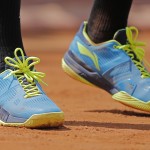 
              Croatia's Marin Cilic's shoes are tied with five loops which appear to form a flower as he plays the third round match of the French Open tennis tournament against Argentina's Leonardo Mayer at the Roland Garros stadium, in Paris, France, Saturday, May 30, 2015. (AP Photo/Christophe Ena)
            