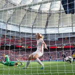 
              Netherlands goalkeeper Loes Geurts (1) allows a goal to Japan's Saori Ariyoshi as Netherlands' Stefanie van der Gragt (3) defends during the first half of a round of 16 soccer match at the FIFA Women's World Cup, Tuesday, June 23, 2015, in Vancouver, British Columbia, Canada. (Darryl Dyck/The Canadian Press via AP)
            