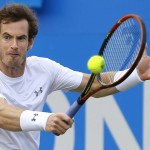 
              Andy Murray of Britain plays a return to Viktor Troicki of Serbia during their semifinal tennis match at the Queen's Championships in London, Sunday, June 21, 2015. (AP Photo/Kirsty Wigglesworth)
            