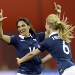
              France's Louisa Necib, left, celebrates her goal against Germany with teammate Amandine Henry during the second half of a FIFA Women's World Cup quarterfinal soccer game, Friday, June 26, 2015, in Montreal, Canada. (Ryan Remiorz/The Canadian Press via AP) MANDATORY CREDIT
            