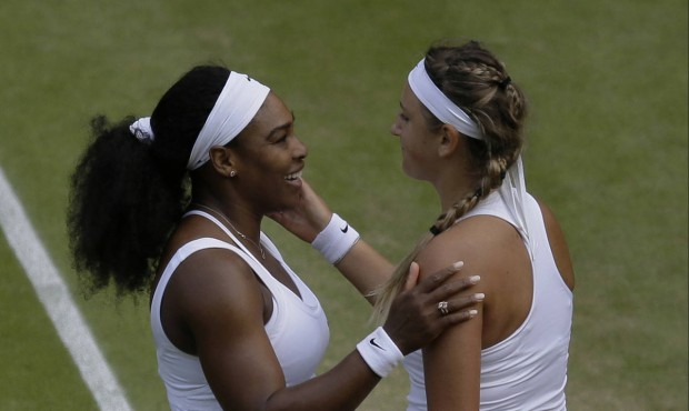 Serena Williams of the United States talks to Victoria Azarenka of Belarus, after defeating her in ...