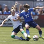 
              United States’ Meghan Klingenberg (22) and Ireland's Julie Ann Russell (11) battle for the ball during the first half of an exhibition soccer match, Sunday, May 10, 2015, in San Jose, Calif. (AP Photo/Tony Avelar)
            