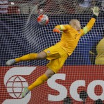 
              The ball gets past United States goalkeeper Brad Guzan for a Jamaica goal during the first half of a CONCACAF Gold Cup soccer semifinal. Wednesday, July 22, 2015, in Atlanta. (AP Photo/John Bazemore)
            
