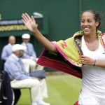
              Madison Keys of the United States celebrates winning the match against Olga Govortsova of Belarus  during their singles match at the All England Lawn Tennis Championships in Wimbledon, London, Monday July 6, 2015. Keys won3-6, 6-4, 6-1.(AP Photo/Pavel Golovkin)
            