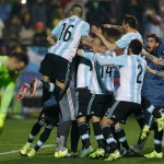 
              Argentina's players jump over Carlos Tevez after scored the winning penalty kick against Colombia during a Copa America quarterfinal soccer match at the Sausalito Stadium in Vina del Mar, Chile, Friday, June 26, 2015. (AP Photo/Ricardo Mazalan)
            