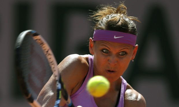 Lucie Safarova of the Czech Republic returns in the semifinal match of the French Open tennis tourn...