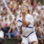 
              FILE - In this July 7, 1990 file photo, Martina Navratilova  celebrates  during the Ladies Singles Championship match with fellow American, Zina Carrison at the All England Lawn Tennis Championships in Wimbledon, London.  Navratilova, a Czech-born left-hander who became a U.S. citizen in 1981, won 18 Grand Slam singles titles, including nine Wimbledon crowns between 1978 and 1990. Navratilova was named The Associated Press’s “Female Athlete of the Year” on two occasions in the 1980s. While on the comeback trail in 2003, she won the mixed doubles at the age of 46 to claim her 20th Wimbledon title, equaling Billie Jean King’s record. (AP Photo/Dave Caulkin, File)
            