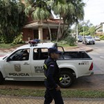 
              Police patrol outside the home of Nicolas Leoz who's under house arrest in Asuncion, Paraguay, Wednesday, June 3, 2015. Leoz, former Conmebol president and former FIFA executive member, was indicted in a bribery and money-laundering scheme in a FIFA investigation. Leoz has said he'll fight a U.S. extradition order. (AP Photo/Jorge Saenz)
            