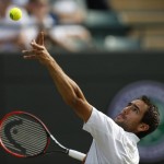 
              Marin Cilic of Croatia serves to John Isner of the United States during their singles match at the All England Lawn Tennis Championships in Wimbledon, London, Friday July 3, 2015. (AP Photo/Pavel Golovkin)
            