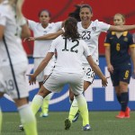 
              United States' Christen Press (23) celebrates her goal against Australia with Lauren Holiday (12) during a FIFA Women's World Cup soccer match in Winnipeg, Manitoba, Monday, June 8, 2015. (John Woods/The Canadian Press via AP) MANDATORY CREDIT
            