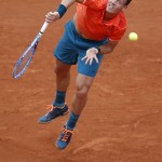 
              Czech Republic's Tomas Berdych serves the ball to Japan's Yoshihito Nishioka during their first round match of the French Open tennis tournament at the Roland Garros stadium, Monday, May 25, 2015 in Paris,  (AP Photo/Michel Euler)
            