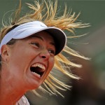 
              Russia's Maria Sharapova serves to Lucie Safarova of the Czech Republic during their fourth round match of the French Open tennis tournament at the Roland Garros stadium, Monday, June 1, 2015 in Paris, France. (AP Photo/Christophe Ena)
            