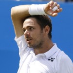 
              Switzerland's Stan Wawrinka gestures after missing a point against South Africa's Kevin Anderson, during their men's singles tennis match of  the Queen's tennis championship, in London, Wednesday, June 17, 2015. (AP Photo/Kirsty Wigglesworth)
            