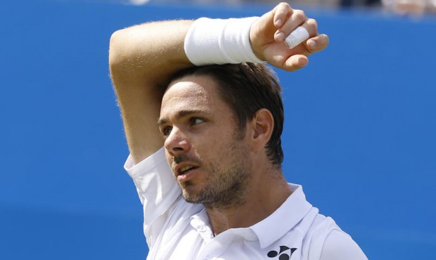 Switzerland’s Stan Wawrinka gestures after missing a point against South Africa’s Kevin...