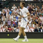 
              Andy Murray of Britain celebrates at match point as he plays against Vasek Pospisil of Canada, during the men's quarterfinal singles match at the All England Lawn Tennis Championships in Wimbledon, London, Wednesday July 8, 2015. (AP Photo/Kirsty Wigglesworth)
            