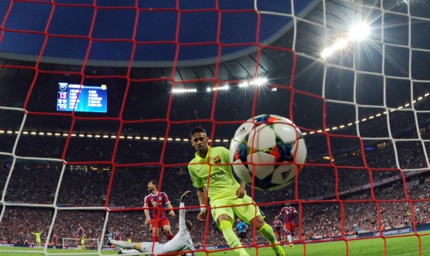 Barcelona’s Neymar scores his side’s opening goal during a Champions League semi final ...