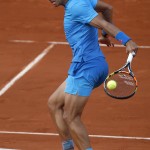 
              Spain's Rafael Nadal plays a shot in the fourth round match of the French Open tennis tournament against Jack Sock of the U.S. to win in four sets 6-3, 6-1, 5-7, 6-2, at the Roland Garros stadium, in Paris, France, Monday, June 1, 2015. (AP Photo/Michel Euler)
            