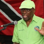 
              Former FIFA vice president Jack Warner speaks at a political rally in Marabella, Trinidad and Tobago, Wednesday, June 3, 2015. One moment, Jack Warner is on TV telling his countrymen in Trinidad that he fears for his life. An hour later, he's standing on a packed narrow street at a political rally telling supporters that he fears nothing. Indicted by the United States on charges of racketeering, wire fraud and money-laundering, Warner is officially an internationally wanted man, listed as one of Interpol’s most wanted persons. (AP Photo/Anthony Harris)
            