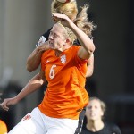 
              Netherlands' Lieke Martens (11) heads the ball as New Zealand's Ria Percival (2) defends during a FIFA Women's World Cup soccer match in Edmonton, Alberta Saturday,  June 6, 2015. (Jeff McIntosh/The Canadian Press via AP)
            