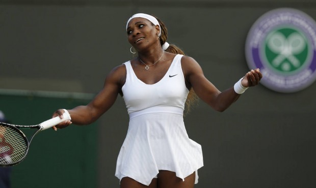 FILE – In this June 28, 2014, file photo, Serena Williams gestures during a women’s sin...