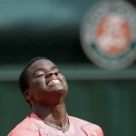 
              USA's Frances Tiafoe reacts as he plays  Slovakia's Martin Klizan during their first round match of the French Open tennis tournament at the Roland Garros stadium, Monday, May 25, 2015 in Paris,  (AP Photo/Francois Mori)
            