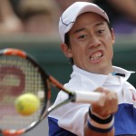 
              Japan's Kei Nishikori returns the ball to France's Paul-Henri Mathieu during their first round match of the French Open tennis tournament at the Roland Garros stadium, Sunday, May 24, 2015 in Paris,  (AP Photo/Christophe Ena)
            