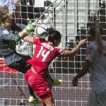 
              Canada's Melissa Tancredi tries to get a shot past Switzerland goalkeeper Gaelle Thalmann during the first half of the FIFA Women's World Cup soccer action in Vancouver, British Columbia, Canada on Sunday June 21, 2015. (Jonathan Hayward/The Canadian Press via AP)
            