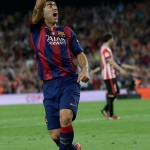 
              Barcelona's Luis Suarez celebrates his side’s second goal during the final of the Copa del Rey soccer match between FC Barcelona and Athletic Bilbao at the Camp Nou stadium in Barcelona, Spain, Saturday, May 30, 2015. (AP Photo/Manu Fernandez)
            