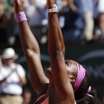 
              Serena Williams of the U.S. celebrates winning the final of the French Open tennis tournament against Lucie Safarova of the Czech Republic in three sets, 6-3, 6-7, 6-2, at the Roland Garros stadium, in Paris, France, Saturday, June 6, 2015. (AP Photo/Michel Euler)
            