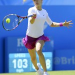 
              Canada's Eugenie Bouchard returns the ball to Switzerland's Belinda Bencic during day five of the women's international tennis tournament at Devonshire Park, Eastbourne, England, Wednesday June 24, 2015. (Gareth Fuller/PA via AP) UNITED KINGDOM OUT  NO SALES  NO ARCHIVE
            