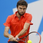 
              Gilles Simon of France plays a return to Kevin Anderson of South Africa during their semifinal tennis match at the Aegon Championships in London, Saturday, June 20, 2015. (AP Photo/Kirsty Wigglesworth)
            