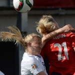 
              England's Laura Bassett, left, battle for a head ball during the first half of a second round soccer game at the FIFA Women's World Cup, Monday, June 22, 2015, in Ottawa, Ontario, Canada. (Sean Kilpatrick/The Canadian Press via AP) MANDATORY CREDIT
            