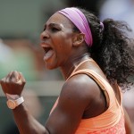 
              Serena Williams of the U.S. clenches her fist after scoring a point in the quarterfinal match of the French Open tennis tournament against Italy's Sara Errani at the Roland Garros stadium, in Paris, France, Wednesday, June 3, 2015. (AP Photo/Christophe Ena)
            