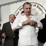 
              International Boxing Hall of Fame inductee, Ray Mancini, tries on his induction ring immediately following the International Boxing Hall of Fame Induction ceremony in Canastota, N.Y., Sunday, June 14, 2015. (AP photos/Heather Ainsworth)
            