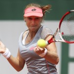
              Russia's Ekaterina Makarova returns the ball to compatriot Elena Vesnina during their third round match of the French Open tennis tournament at the Roland Garros stadium, Friday, May 29, 2015 in Paris,  (AP Photo/David Vincent)
            