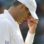 
              John Isner of the United States reacts as he plays Marin Cilic of Croatia during their singles match at the All England Lawn Tennis Championships in Wimbledon, London, Friday July 3, 2015. (AP Photo/Pavel Golovkin)
            