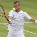 
              Lleyton Hewitt of Australia plays a return to Kevin Anderson of South Africa during their singles tennis match at the Aegon Championships in London, Monday, June 15, 2015. (AP Photo/Kirsty Wigglesworth)
            