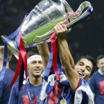 
              Barcelona's Luis Suarez and Neymar celebrates with the trophy after after the Champions League final soccer match between Juventus Turin and FC Barcelona at the Olympic stadium in Berlin Saturday, June 6, 2015. Barcelona won the match 3-1.  (AP Photo/Frank Augstein)
            
