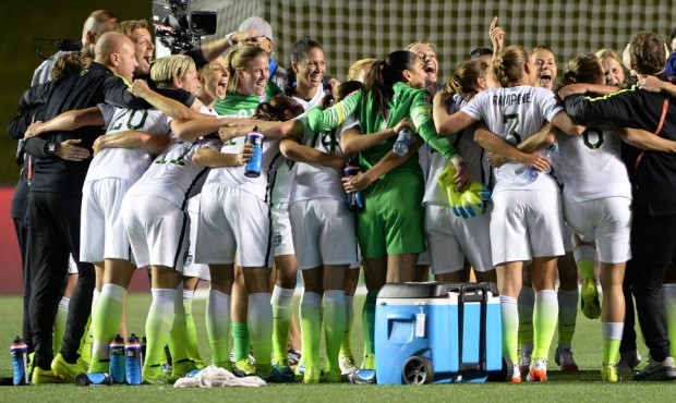 The United States team celebrates a 1-0 win over China in a quarterfinal match in the FIFA Women&#8...