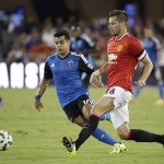 
              CORRECTS SPELLING TO SCHNEIDERLIN, INSTEAD OF SCHNIDERLEIN - Manchester United midfielder Morgan Schneiderlin, right, and San Jose Earthquakes midfielder Matias Perez Garcia vie for the ball during the first half of an International Champions Cup soccer match Tuesday, July 21, 2015, in San Jose, Calif. (AP Photo/Eric Risberg)
            