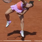 
              Italy's Sara Errani serves in the quarterfinal match of the French Open tennis tournament against Serena Williams of the U.S. at the Roland Garros stadium, in Paris, France, Wednesday, June 3, 2015. (AP Photo/David Vincent)
            
