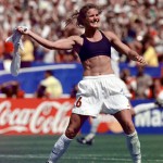 
              FILE - In this July 10, 1999, file photo, the United States' Brandi Chastain celebrates by taking off her jersey after kicking in the game-winning goal in penalty shootout goal against China in the FIFA Women's World Cup Final at the Rose Bowl in Pasadena, Calif. The last time the United States played China was at the World Cup final in 1999. The two countries play on Friday in the quarterfinals of the FIFA Women's World Cup in Canada. (AP Photo/Mark J. Terrill, File)
            