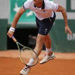 
              France's Richard Gasquet returns the ball to Belgium's Germain Gigounon during their first round match of the French Open tennis tournament at the Roland Garros stadium, Tuesday, May 26, 2015 in Paris, . (AP Photo/Francois Mori)
            
